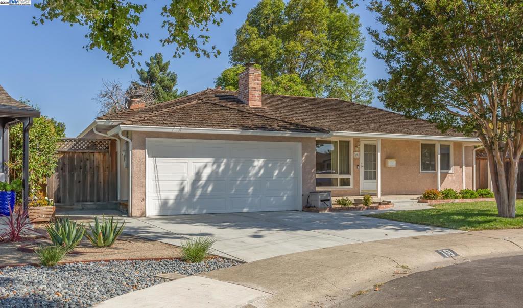 Attention! All savvy home buyers and investors. Welcome to 19 Via Hermosa, San Lorenzo. This home offers a fantastic opportunity to personalize and make it your own. Located in the desirable San Lorenzo Village community, this inviting single-level ranch-style home sits on a quiet cul-de-sac and offers 1,590 sq ft of living space on an expansive 8,012 sq ft lot, featuring 3-bedrooms and 1.5-bathroom. Step onto the charming front porch and into a formal living room featuring a cozy fireplace. The home offers an open floor plan that flows seamlessly into the dining area and a spacious family room with vaulted ceilings—ideal for gatherings and entertaining. The family room opens to a large backyard with a beautifully manicured lawn and a mature trees lining the property for added privacy, perfect for relaxing, gardening, playtime with kids or even potential ADU development (buyer to verify). Additional highlights include: • Generous lot size with plenty of outdoor space • Two-car garage with extra storage • Located just minutes from shopping, dining, schools and parks • Easy access to freeways and approximately 2 miles from BART Offered As-Is. Bring your vision and creativity—don’t miss this chance to make 19 Via Hermosa your new home!
