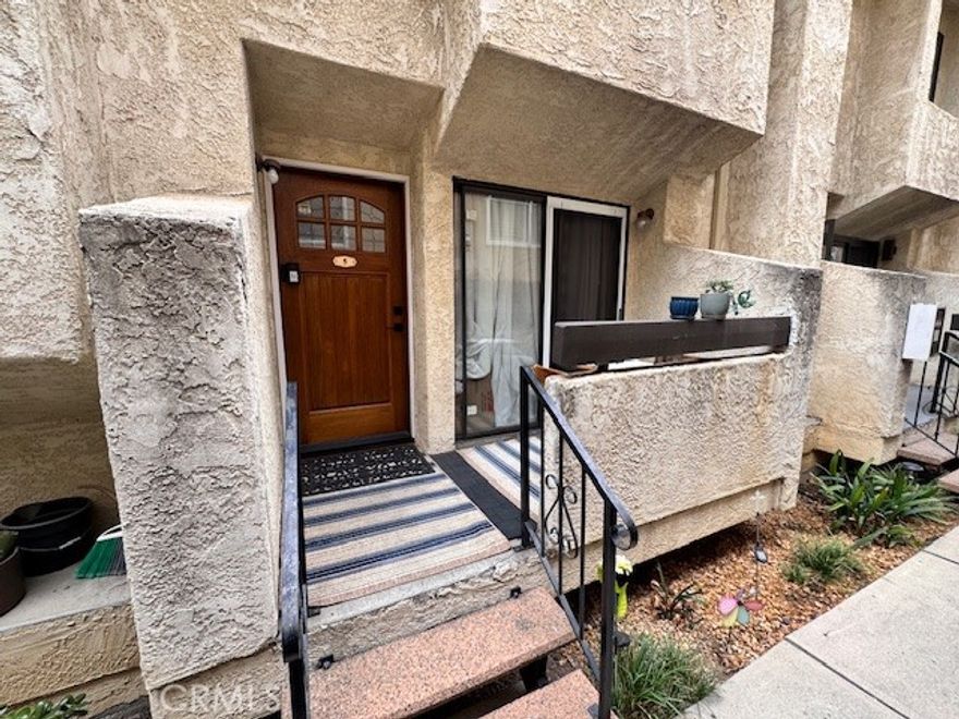 PRICE IMPROVEMENT! Welcome to unit #5, this well-maintained tri-level condo located in the highly desirable Northwest Glendale neighborhood. This spacious home offers an open and functional layout with updated flooring, neutral interior paint, and excellent natural light throughout.
The main level features a comfortable living room with a fireplace and direct access to the dining area—ideal for everyday living and entertaining. The kitchen offers ample cabinet storage, tile counters, stainless-steel appliances, and a breakfast bar that opens to the dining space. A stylishly powder room with modern fixtures completes this floor.
The upper level includes 2 generously sized remodeled bedrooms suites with large closets, and each bedroom with stylishly bathrooms remodels, and thoughtful updates that offer comfort and convenience. Additional features include in-unit laundry, central heating and air, dual-pane windows, updated light fixtures, and an attached private parking garage with 2 designated parking spots and storage. Newer Bradford 50-gallon hot water heater, newer carpet, newer flooring throughout. This townhome is part of a well-maintained community located near Brand Park, Kenneth Village, Downtown Glendale, local shops, dining, and award-winning schools, with convenient access to the 134 and 5 freeways.  So many upgrades to mention. Hurry this one will not last.