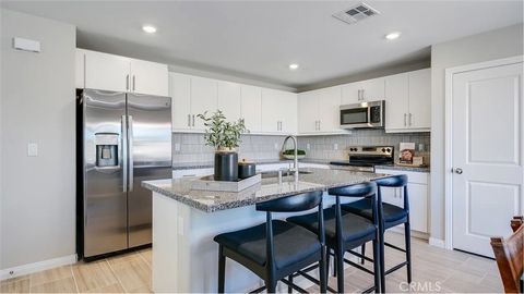 Photo of 7216 Serene Skies Court, Jurupa Valley, CA 92509 (MLS # SW26065261)