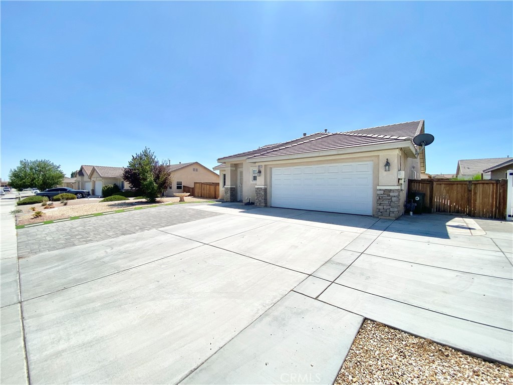Discover comfort, convenience, and easy living in this beautifully maintained 3-bedroom, 2-bath home located in a peaceful Adelanto neighborhood. Whether you're a first-time buyer, growing family, or investor, this home offers a perfect blend of functionality and style.
Step inside to an inviting open floor plan that creates a seamless flow between the living, dining, and kitchen areas—ideal for hosting guests or enjoying cozy nights at home. Large windows fill the space with natural light, giving the entire home a warm and airy feel.
The kitchen offers ample cabinet and counter space, making meal prep easy and efficient. The adjoining dining area opens into the spacious living room, perfect for gatherings or quiet evenings in.
Outside, you'll appreciate the low-maintenance, drought-tolerant front yard—a recently updated space designed to conserve water while maintaining great curb appeal. The home also comes equipped with a water softener system, enhancing water quality and protecting your plumbing and appliances.
Enjoy year-round outdoor living in the private backyard featuring a covered patio, ideal for BBQs, relaxing, or entertaining. A cement slab surrounds perimeter of the home, providing a clean, durable surface for outdoor furniture, storage, or additional recreational space.
This home offers the perfect opportunity to enjoy modern comfort, indoor-outdoor living, and low-maintenance landscaping—all at an affordable price. Don't miss your chance to make this wonderful property your own.
**Schedule your private showing today!**