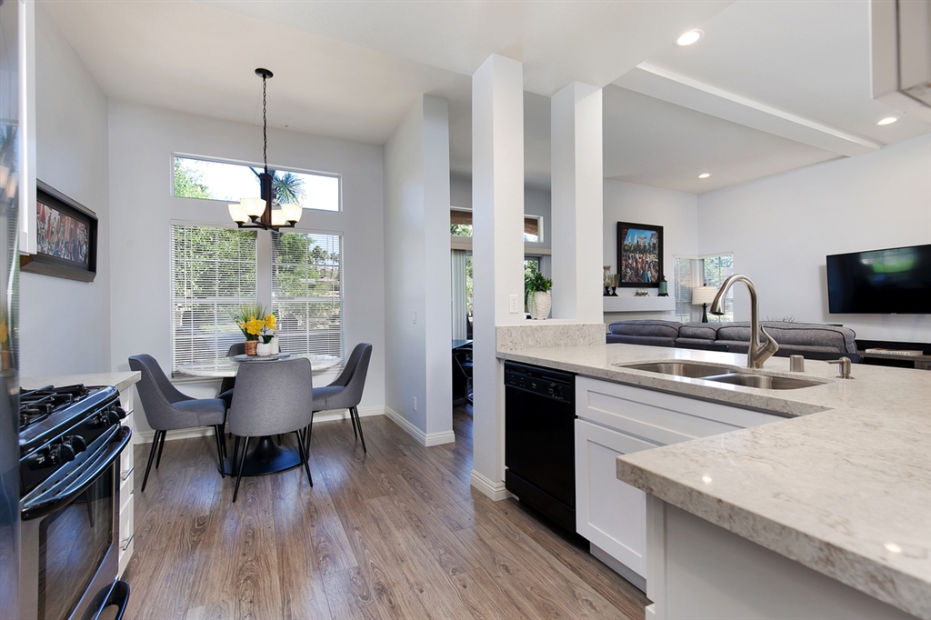 Lovely ground floor corner home in Belsera. Beautifully remodeled kitchen, architecturally pleasing features and soaring ceilings create a feeling of great space. A bright dining nook with garden views and a wide bar counter make meal time a happy occasion. Lounge peacefully on the private, large patio. Conveniently located with easy access to freeways and steps to Mission Trails hiking. The community’s two pools, volleyball court and plenty of green space add to the appeal of this park-like neighborhood. Complex Features: ,,, Equipment: Garage Door Opener Other Fees: 0 Sewer: Sewer Connected Topography: LL