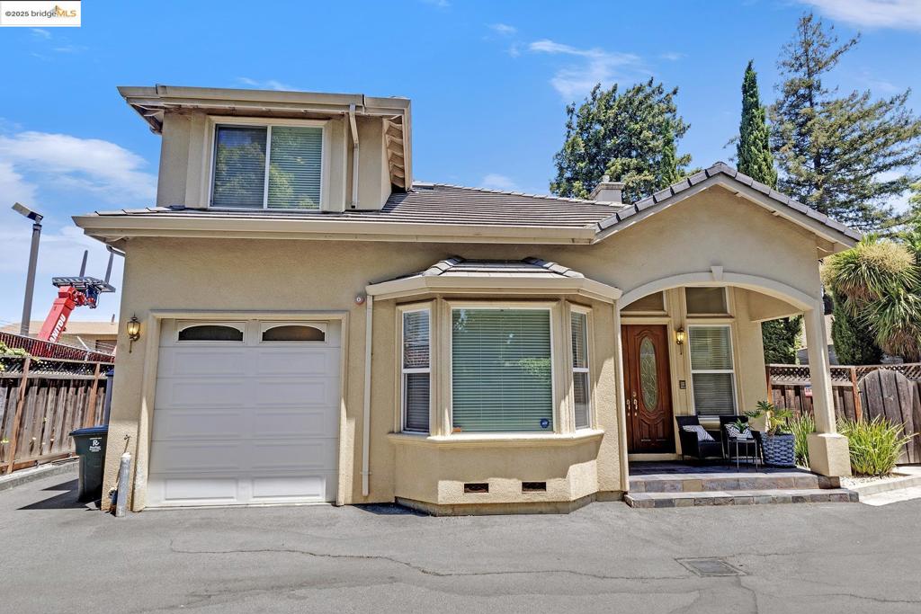 Welcome to 35 Amherst Ct, a beautiful home that seamlessly blends comfort, style, and convenience. Offering 1,700 sq. ft. of light-filled living space, this stunning two-story residence is tucked away on a quiet, private court in a well sought after Menlo Park neighborhood. Step inside to discover a spacious floor plan, featuring 3 bedrooms and 3 bathrooms. The thoughtful layout is ideal for both everyday living and entertaining, with a convenient downstairs bedroom and full bath, perfect for guests, a home office, or multigenerational living. Upstairs, you’ll find a luxurious master suite alongside a junior suite. Built in 2005, this contemporary home showcases elegant design details throughout, including high vaulted ceilings that fill the space with natural light, rich hardwood floors, and a warm, welcoming ambiance. Enjoy the convenience of nearby commute routes, shopping, and dining, all just moments away.