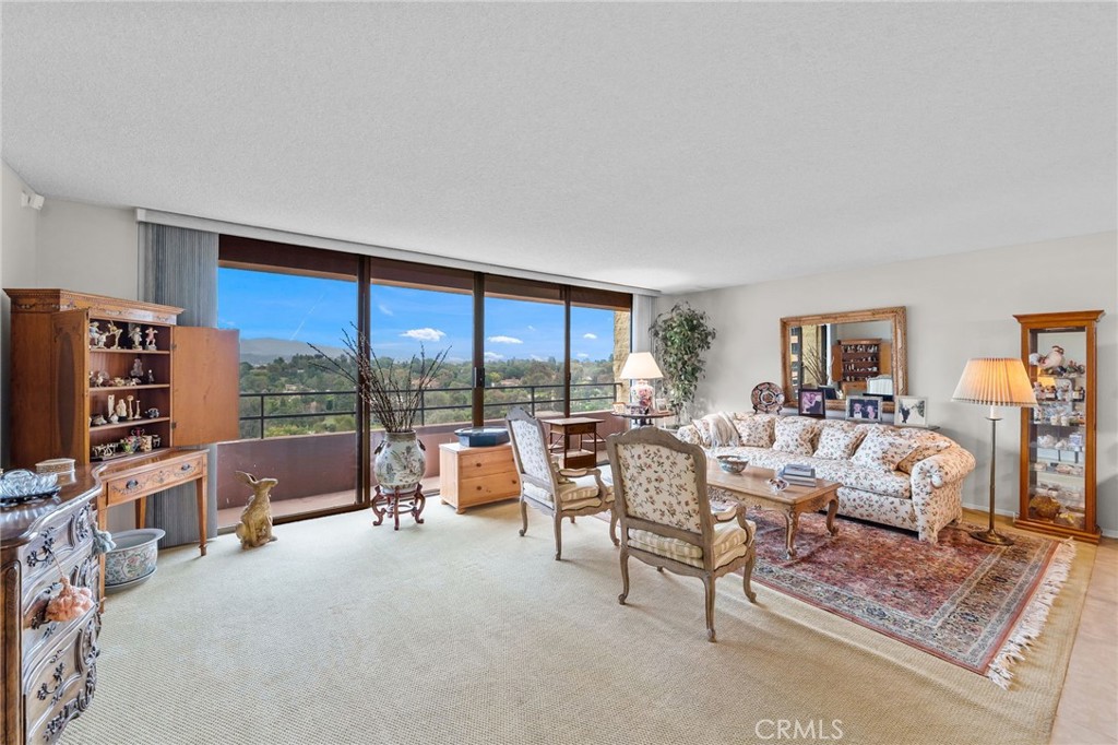 *** POPULAR EAST facing “C” model condo, with STUNNING Golf course and Saddleback Mountain Views *** Expanded kitchen with white cabinetry, light counter tops, smooth cook top, lots of cabinets and drawers. The huge living room has floor to ceiling sliding doors that open onto step-out balcony with breathtaking views of Saddleback Mountain, the golf course and Laguna Woods. The master bedroom is massive and has another slider to a step out balcony plus a large walk in closet. The guest bedroom features custom built in cabinetry and sliding doors to the balcony. The en suite master bathroom features a separate vanity and private room with the toilet and shower. The hall bathroom has a step in shower. Located in Laguna Woods, a SENIOR community, the Towers amenities currently INCLUDED in the monthly fee: Meal Plan with 500 dining dollars per month *** Electricity - Water - Trash - Basic Cable - Housekeeping twice a month. Living in Laguna Woods means access to bus system around the community, to area shopping, restaurants, medical facilities; 5 pools & 4 hot tubs; 27-hole golf course, tennis, library, state-of-the art crafts facility, 7 clubhouses, 200+ clubs, 3 fitness centers, theater, horseback riding/stables, garden centers, basketball, billiards, bocce ball, Emeritus classes & more! Resort style living at its best!