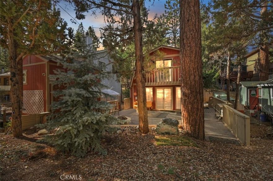 172 Vista Lane | Sugarloaf, CA Immaculate mountain home near Big Bear Lake with exceptional pride of ownership throughout. This well-maintained property features a welcoming living area with a cozy fireplace, two oversized bedrooms—each with a deck—and a flexible layout with space for a third bedroom or home office. Set on a rare double lot, the home offers a fully fenced yard and two powered sheds, excellent for a workshop, studio, or additional storage. Recent upgrades include high-efficiency heating and upgraded windows for year-round comfort. A turnkey option for full-time living, a second home, or potential vacation use—minutes from Big Bear Lake, ski resorts, hiking, and national forest access.