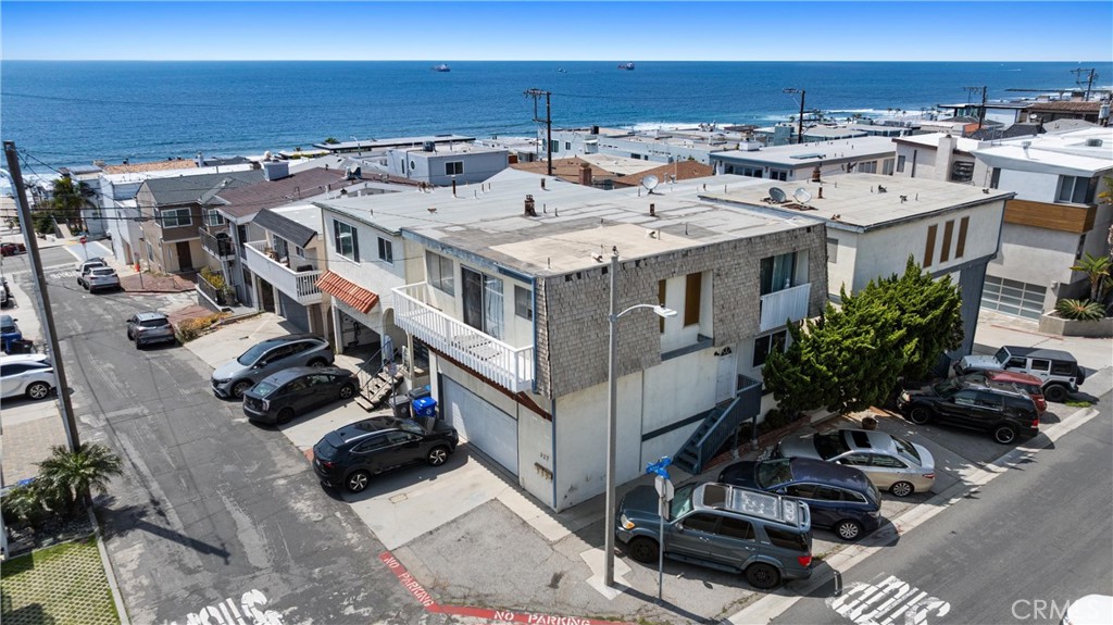 Are you looking for a 4-Plex in the world famous "sand section" of Manhattan Beach? If so, 330 34th Place is just what you have been looking for! You know what they say in real estate... It is all about LOCATION, LOACATION, LOCATION, and this property is primely located within walking distance to the beach, all of the local shops, restaurants, bars, and entertainment. It is truly one of those "love where you live" locations. As you would imagine, this is extremely appealing to tenants, and is why there is never a shortage of renters willing to pay premium rents to live in the units. This 4-Plex is comprised of 2 buildings (327 34th St and 330 34th Pl) on a single 30' x 90' parcel. Both buildings have a 2 Bedroom and 2 Bathroom unit upstairs with ocean views, and a 1 bedroom and 1 bathroom unit downstairs, as well as a 2 car garage and a common area deck to soak up the sun and relax. 3 of the 4 units are tenant occupied (on month-to-month leases), and 1 of the units is vacant. Don't miss the opportunity to make this 4-Plex yours! With its amazing location and the upside for increases in rents, whether you are an investor or an owner/user, this property is an amazing investment opportunity!