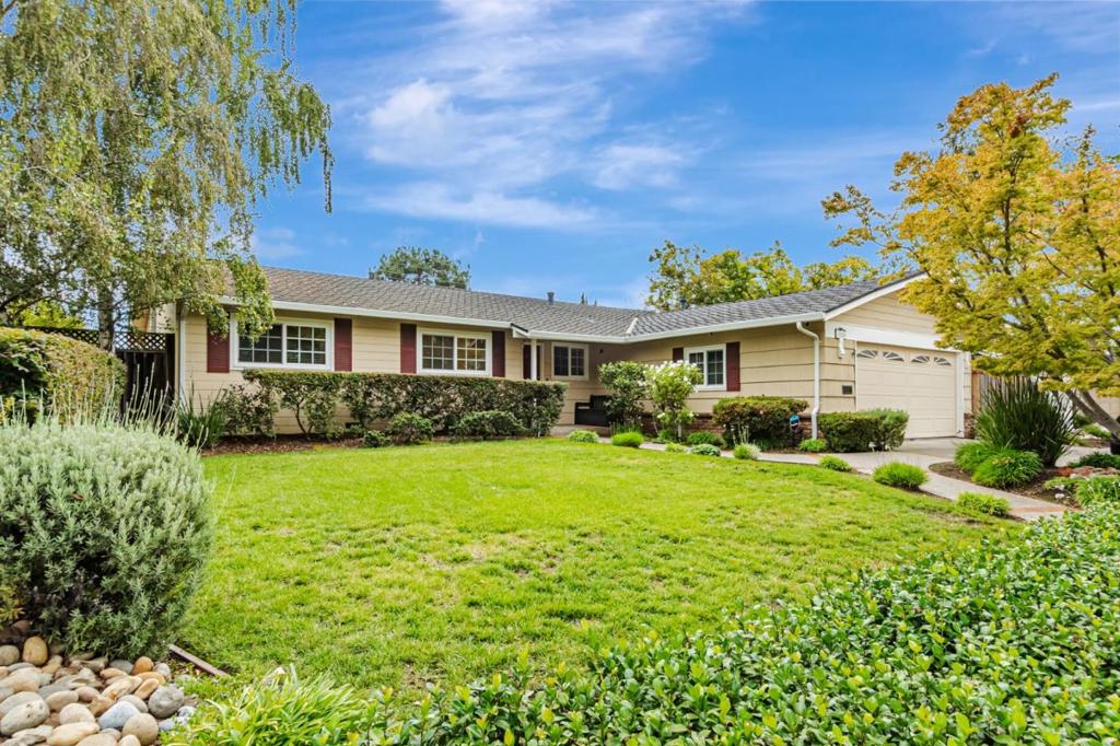 Move right into this beautifully remodeled single-story home, ideally located at the border of Los Altos and Cupertino.Just minutes from Apple, Google, and LinkedIn and, close to top-rated schools, this residence offers both convenience and lifestyle.Inside, the home showcases oak hardwood floors, recessed lighting, and a sleek remote-controlled fireplace.The gourmet kitchen is a true centerpiece, featuring quartzite countertops, premium appliances, a panel-ready refrigerator, a Sub-Zero wine cooler, and custom maple cabinetry.The common bath has been thoughtfully updated with modern fixtures, wainscoting, marble countertops, and a contemporary finish.The primary suite provides a private retreat with restroom, a smart LED-lit mirror medicine cabinet, Toto toilet, and a spacious shower.Dual pane windows throughout. Outdoors, enjoy a private wraparound backyard designed for relaxation and entertaining, complete with a spa, citrus trees, fountains, and vibrant landscaping.A two-car garage adds everyday practicality to this stunning property.