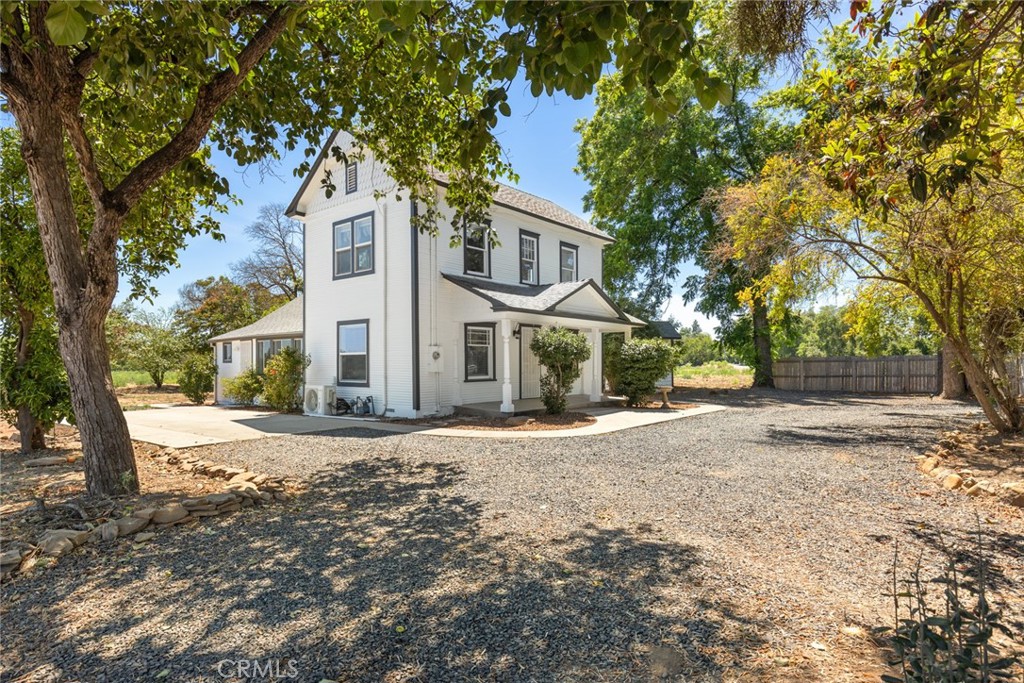 Charming 1900 farmhouse with beautiful added upgrades in keeping with an old Chico home. House sits on 10 acres of prime Chico Vina loam soil. With 10 acres you have plenty of room to create your dream property! New well, new split systems, remodeled bathrooms, new paint inside and out!