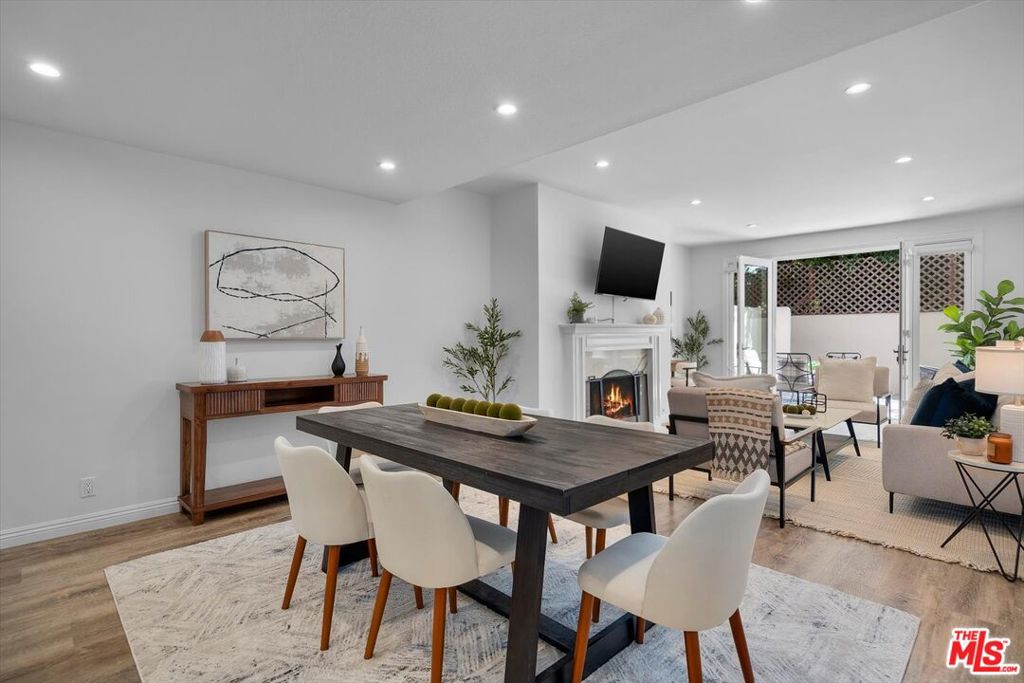 Located in one of Westwood's most desirable neighborhoods, this beautifully remodeled unit offers the perfect blend of style, comfort, and convenience. Spanning approximately 1,000 square feet, the home features a spacious bedroom with a full en-suite bathroom, along with a second bathroom off the hallway for guests. The bright and airy living room is filled with natural light and opens to an expansive private porch, ideal for outdoor lounging or entertaining. A dedicated dining area flows into the living space, while the kitchen offers stainless steel appliances and generous cabinet storage. Additional highlights include excellent closet space throughout, in-unit laundry, secured parking, and a controlled-access building. Enjoy being just minutes from Westwood's best restaurants, shopping, entertainment, and major freeways.