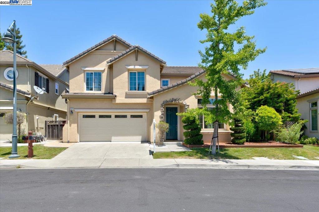Stunning 5-bedroom, 3-bathroom home located in the highly desirable Dublin Ranch. This home boasts a dramatic entry with soaring volume ceilings, leading to a spacious formal living and dining room perfect for entertaining. The home features brand-new flooring throughout, adding a fresh and modern touch to every room. A convenient full bedroom and bathroom are located downstairs, ideal for guests or multigenerational living. The chef's kitchen is a true highlight, complete with newly installed quartz countertops, a new sink, and faucet, perfect for preparing gourmet meals. Fresh interior paint throughout creates a clean, welcoming atmosphere, while the expansive yard provides plenty of room for outdoor activities and relaxation. This home is ideally located near top-rated schools, parks, shopping, and more, offering a blend of luxury and convenience. Don’t miss the opportunity to make this beautiful home yours!