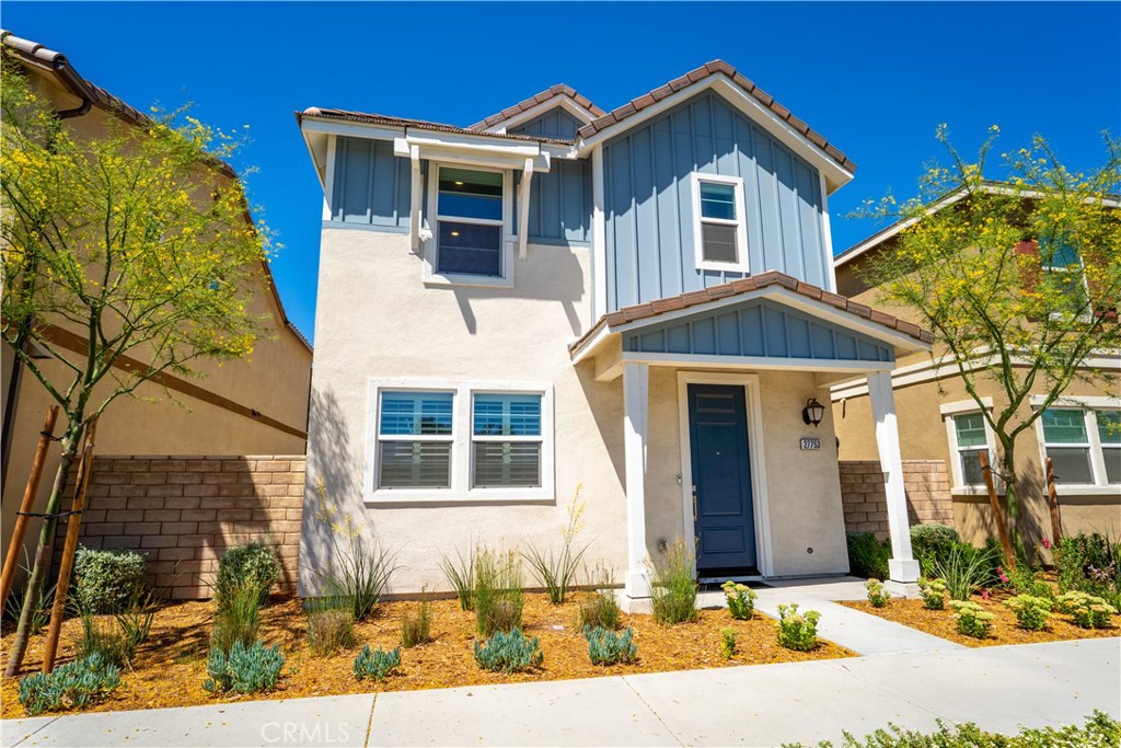 This exquisite newer home is located in the highly desirable Vista Canyon community. The 1,590 sq. ft. home is perfect for entertaining as it flows nicely between the living room, kitchen and dining area and through sliding glass doors into the patio and side-yard. The kitchen is fit for a chef as it includes a gigantic island with quartz counters, upgraded shaker cabinets and stainless appliances. The massive primary bedroom is located upstairs and includes a huge walk-in closet with an en-suite bathroom featuring dual sinks, vanity station and step-in shower with glass enclosure. The second bedroom is also spacious and includes views of the park. Both the second and third bedrooms upstairs share the hallway bathroom which has dual sinks and a tub with shower. This KB home is an ENERGYSTAR® certified home and also includes fully owned solar panels, upgraded flooring, recessed lights, cat6 wiring, tankless water heater and Moen fixtures in the kitchen and bathrooms. There is also a powder room on the first level for guests. Community features included a pool, hot tub, clubhouse and playground. The home is in a perfect location in the development as it is across the street from a park that has gorgeous oak trees, a big grass area, tennis courts, pickleball courts and a basketball court. Within walking distance to the Metro Link and easy access to the 14 freeway.