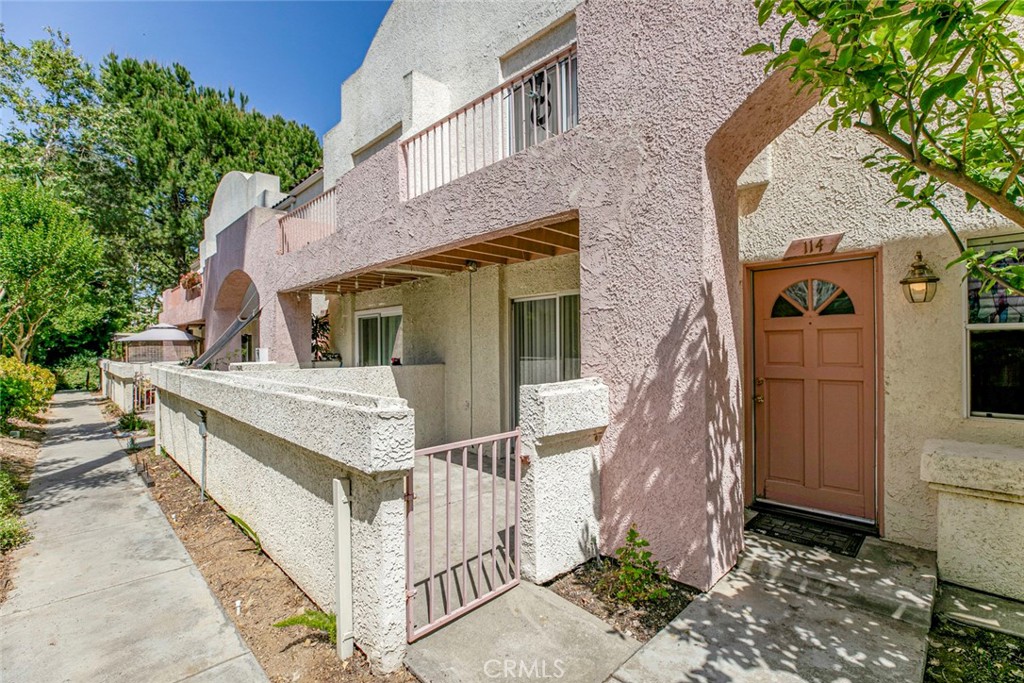 Welcome to this beautifully upgraded townhome offering comfort, style, and versatility in the heart of Pacoima. This spacious two-bedroom, two-and-a-half-bathroom residence features a thoughtful layout with en-suite bathrooms in both bedrooms, making it ideal for privacy and convenience. Enjoy brand newlaminate flooring in the bedrooms and fresh paint throughout the entire unit, creating a clean and modern feel. The primary suite boasts its own private balcony,and the secondary bedroom also enjoys balcony access — one of three balconies plus a charming private patio, perfect for entertaining or relaxing. A bonus roomadds flexibility for a home office, gym, or guest space, while recent upgrades throughout the home enhance its appeal and functionality. From the modern finishesto the well-maintained common areas, this townhome offers a turnkey opportunity in a secure, gated community with pool and spa. Don’t miss the chance to owna beautifully maintained home with abundant natural light, multiple outdoor spaces, and a highly livable floor plan.