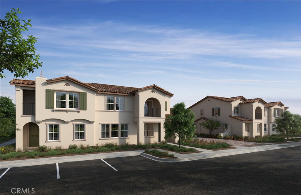 Belmont is a beautiful new condo resort-style community in the newer area of Ontario Ranch. This floor plan offers 1,880 sq/ft of open floor plan spread across 2 floors. Take note of the expansive 9-ft ceilings bringing a nice vaulted feel at the first floor when you walk in. This open floor plan features the living, dining and kitchen downstairs for maximum space in the living and dining areas. Laundry is also upstairs for convenience. Our homes offer brand-new stainless steel appliances including a slide in gas stove, dishwasher and microwave. Additionally, there is a powder room downstairs for convenience. The upstairs leads right into an open loft the family can enjoy and two secondary bedrooms nearby as well. Those two bedrooms share a large hallway bathroom that has a tub/shower combination. The spacious primary bedroom is a short walk away and has a large walk-in closet, adjoining bath with cultured marble counter tops, and dual sinks to round out a great primary bathroom . There is also a large balcony accessible from the loft for you to relax at after a long day. Each home is built with uncompromising energy efficiency in mind such as a tankless water heater, smart thermostat, dual-pane low E glass windows and so much more to help ensure uninterrupted comfort all year long. All that is complemented by a solar energy system as well to maximize savings(lease or purchase required). Community amenities include several parks, pool and spa, dog park, bbq areas and pickle ball court. Easy access to the I-15, I-10, and 60 Freeways nearby. You are also close to shopping at Costco®, 99 Ranch Market, Cloverdale Marketplace and Eastvale Gateway. Ontario International Airport and Ontario Mills Mall are also just a short drive away. Belmont is conveniently located just 2.5 miles away from the brand new Park View elementary school.
Photo is a rendering of the model. Solar Included!