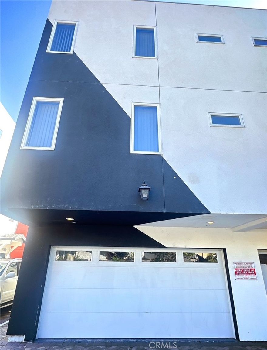 ASK ABOUT RENT SPECIAL. Welcome to this stunning and modern tri-level townhouse located at 1735 1/2 Magnolia Avenue in the heart of Los Angeles. This newer construction offers 1,382 square feet of thoughtfully designed living space within a private, gated six-unit complex. With three spacious bedrooms and three bathrooms, each bedroom provides its own private entrance, a luxurious en-suite bathroom, and a generous walk-in closet, making this home ideal for comfortable and convenient living.



Natural light fills every corner of the home, accentuating the sleek laminate flooring and recessed lighting throughout. The contemporary kitchen is a chef’s dream, featuring a large island for entertaining or meal prep, and equipped with high-end appliances, including a dishwasher, stove, refrigerator, and microwave—all included. Additional features like central heating and air conditioning, in-unit laundry, and modern finishes throughout ensure you’ll live in both comfort and style.



Situated in the bustling neighborhood of Pico-Union, this property offers unmatched access to the best of Los Angeles. Enjoy nearby landmarks like LA Live, the Crypto.com Arena, and the Los Angeles Convention Center, all just minutes away. For those who appreciate history and culture, MacArthur Park and the Wilshire Boulevard Corridor are within close proximity, offering a mix of green space and architectural charm. Food lovers will delight in the diverse dining options nearby, from local taco spots to fine international cuisine. With convenient access to major freeways like the 10 and 110, as well as public transportation options including Metro lines, commuting to Downtown LA, USC, and beyond is a breeze.



This modern townhouse offers not just a home, but a vibrant lifestyle in one of LA’s most dynamic neighborhoods. Don’t miss out—schedule your tour today!