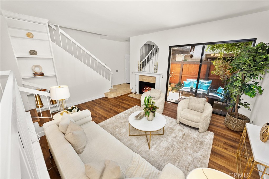 Spacious tri-level townhome in the heart of Arcadia. The living room has high ceilings, a fireplace and access to a private patio. A few steps up from the living room is a formal dining room with built-ins. There is a cozy den attached to the spacious kitchen. The kitchen features an abundance of counter and cupboard space and a breakfast bar. Upstairs there are 3 bedrooms. The Primary Bedroom has a full bath attached, and a balcony. The 2 additional bedrooms share a full bath. The hall between the bedrooms features a laundry closet. The Washer and Dryer are included.
Next to the 2 car attached garage is a Bonus Room, (not included in the square footage). The bonus room is perfect for an office, gym, or studio. The Trust just installed new Luxury Vinyl Flooring, new carpets, new light fixtures in den and dining room. The interior has just been painted.
Enter complex next to mailboxes, turn left at first opening. Unit B is on the left close to the driveway.
Perfect location for shopping, dining, schools, parks, golf course, all just minutes away. Arboretum and Santa Anita Race track also minutes away. The complex features a pool, spa, and several guest parking spaces.