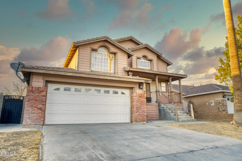 Welcome to your next dream home! This beautifully updated 4-bed, 3-bath residence spans 1,690 SF and is nestled in one of Palmdale's most sought-after neighborhoods. Step inside to an inviting entertainment space featuring a spacious living room with a cozy wood-burning fireplace and expansive windows that flood the room with natural light. The dedicated dining area flows seamlessly into a generously sized kitchen boasting abundant storage, frosted glass cabinetry, and stainless steel appliances. Through the sliding doors, you'll find an oversized rear deck - perfect for dining al fresco or taking in the twinkling lights of the valley below. Also on the main level is the primary suite, complete with a large walk-in closet and an updated ensuite bath with dual sinks. Downstairs, a comfortable family room serves as the heart of the space, offering direct access to the backyard. Three additional bedrooms provide flexibility for guests or a home office, while a full hall bath and laundry area add convenience. The fully fenced backyard includes a large concrete patio and built-in planter boxes, an ideal canvas for creating your dream outdoor entertaining space and home garden. Additional updates include modern lighting, a new water heater, new furnace, and refreshed flooring throughout. With its prime location, thoughtful upgrades, & inviting layout, this is one you won't want to miss! Probate sale. Administrator of the Estate has limited authority. Needs court confirmation.