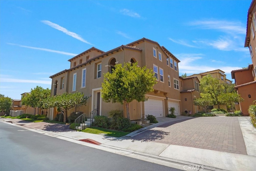 Welcome to this beautifully upgraded townhouse in the prestigious Westridge community! Featuring full slab granite countertops with matching backsplash, stainless steel appliances, and upgraded cabinetry throughout, this home offers the perfect blend of style and functionality. The open-concept design showcases large tile flooring in the entry, kitchen, living, and dining areas, along with a cozy fireplace and a private balcony—perfect for unwinding at the end of the day. A versatile 3rd bedroom can easily serve as a den or home office. The spacious primary suite boasts a ceiling fan, generous walk-in closet, and a spa-like bathroom with a soaking tub and separate shower. Additional highlights include updated carpet, an immaculate interior, and an oversized 2-car direct access garage with extra room for bikes, jet skis and other toys. Seller is open to selling furniture and appliances.
Enjoy resort-style amenities including a clubhouse, two swimming pools, tennis courts, basketball court, and multiple parks—all within a community known for its top-rated schools, proximity to shopping and dining, and easy freeway access. This move-in ready home is a must-see!