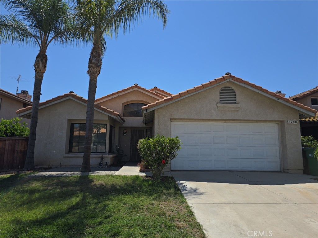 This beautifully maintained, single-story home located at 2988 Dartmouth Circle in Corona, CA offers approximately 1,843 square feet of elegant living space, built in 1989. The home features 4 bedrooms and 2 full bathrooms, highlighted by a bright and open floor plan that includes a formal living and dining area, a cozy family room with fireplace, and an upgraded kitchen—perfect for living and entertaining. The spacious master suite includes an en-suite bathroom and generous closet space. Outside, a well-kept backyard provides a wonderful setting for relaxing or hosting gatherings. Additional conveniences include a two-car garage, central air and heating, and proximity to schools, shopping, parks, and freeway access.