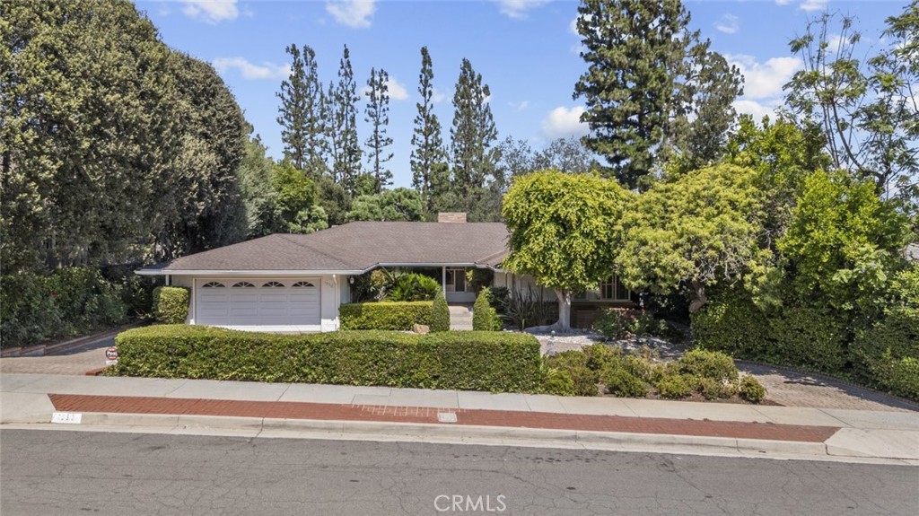 Nestled in the prestigious Oak Knoll neighborhood near the iconic Langham Hotel, this beautifully spacious 3 bedroom 3 bathroom home offers 2246 square feet of comfort and charm, ideally situated on a quiet cul de sac. Featuring a cozy fireplace in the living room, large windows that provide stunning views of the private pool, and a wide open floor plan, this home is perfect for both relaxation and entertaining.
The kitchen is designed with functionality in mind, offering ample counter space and storage, along with a charming breakfast nook. Adjacent to the kitchen is the formal dining room, perfect for family meals or dinner parties. An indoor bar adds a touch of luxury, making this home ideal for those who love to entertain. Additionally, a den, that’s ideal for a home office setup, quiet study, or a peaceful retreat. The spacious bedrooms each provide ample closet space and comfortable layouts. The home features a spacious two car garage along with a convenient circular driveway for ample parking space. Walk out to the expansive pool area, framed by lush trees and serene natural surroundings. From the backyard, a path leads down to a private garden filled with mature fruit trees. This property is an excellent opportunity for buyers interested in making improvements and adding their own style. This coveted neighborhood, surrounded by multi million dollar estates, is known for its elegant architecture and historic charm. It offers a serene, private setting while remaining just moments from Pasadena’s vibrant cultural, shopping, and dining destinations. Presenting a truly special residence. Welcome Home!