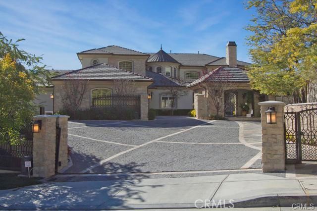 SOLD BEFORE PROCESSING! 1 of 23 Highly sought after Highridge Estates in The Burbank Hills Gated Community. Property has private double gates in front of the Beautiful 360 degree View Pool Estate. 5 Bedrooms, 7 Baths, Media Room, Office, Formal Living room with 23 foot high ceilings and massive fireplace, formal dining room. Kitchen with commercial grade appliances opens up to Family room with Fireplace. Pool & Spa with fire feature. Step down below to BBQ area that looks over the City of Burbank and beyond. Pool house with 3/4 bath. Main Bedroom with sitting area & Fireplace with large balcony with fabulous views.