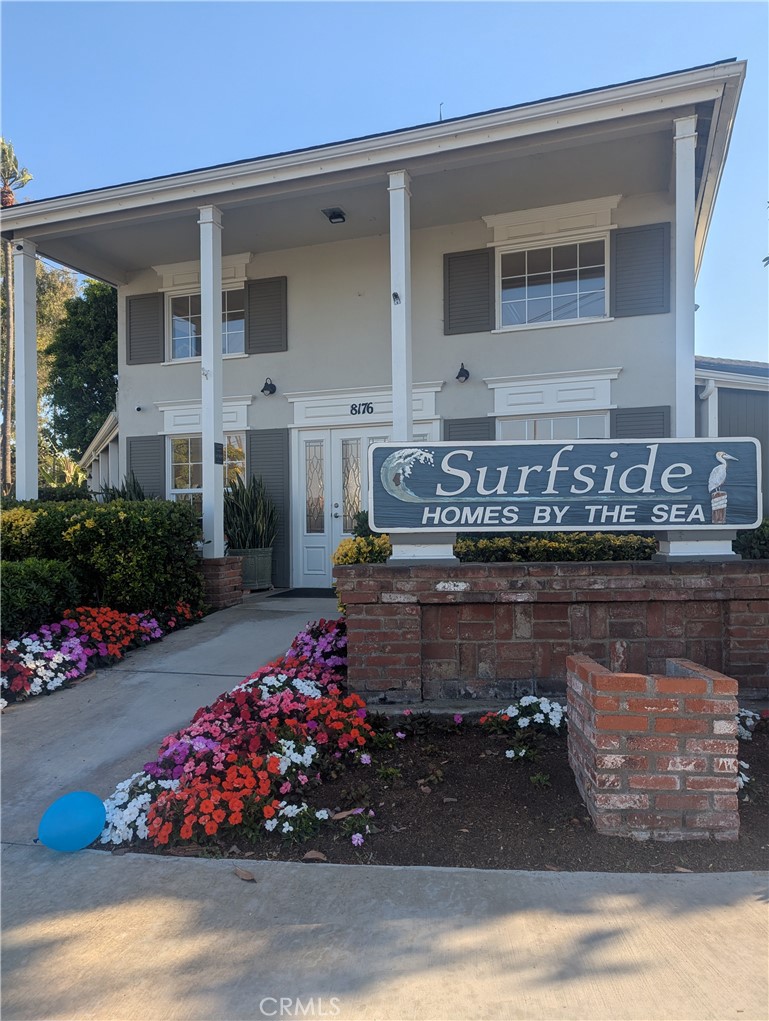 Completely remodeled coastal Gem! Short bike ride to the Sand. Just a 10-minute walk to restaurants and shops. This stunning townhome offers nearly 1400 sq. ft of beautiful, updated living space. The home features brand-new flooring throughout, a modern kitchen with all-new cabinets, range and dishwasher, plus a newly installed forced-air heating unit for year-round comfort. Decorative lighting and window coverings throughout. Modern Ceiling fan in primary suite. Enjoy indoor-outdoor living with a private back patio and raised deck - perfect for relaxing or entertaining. Located in a well=maintained community with two sparkling pools and a clubhouse, and complete with a spacious two-car garage with storage. Don't miss this opportunity to live the beach-close lifestyle in style!