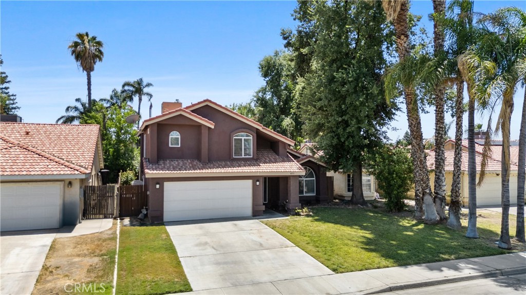 Discover this charming home at 6213 Key West Dr., nestled in a welcoming southwest Bakersfield neighborhood. This 3-bedroom, 2.5-bath residence offers a spacious floor plan with approximately 1,554 sq. ft. of comfortable living space on a generous 6,534 sq. ft. lot. The living room features a cozy fireplace, perfect for relaxing or entertaining guests. The kitchen is practical with ample storage and opens to the dining area, creating a warm and inviting atmosphere. The master bedroom includes an ensuite bathroom and plenty of closet space. Outside, enjoy the convenience of a two-car garage and a manageable yard ideal for outdoor activities. Located close to schools, shopping, and parks, this home offers a great balance of comfort and convenience for everyday living.