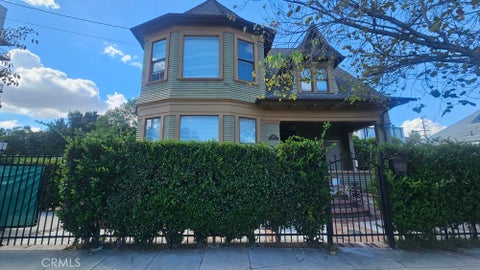 Photo of 2421 W St. Andrews Pl PL, Los Angeles, CA 90018 (MLS # PW26233575)