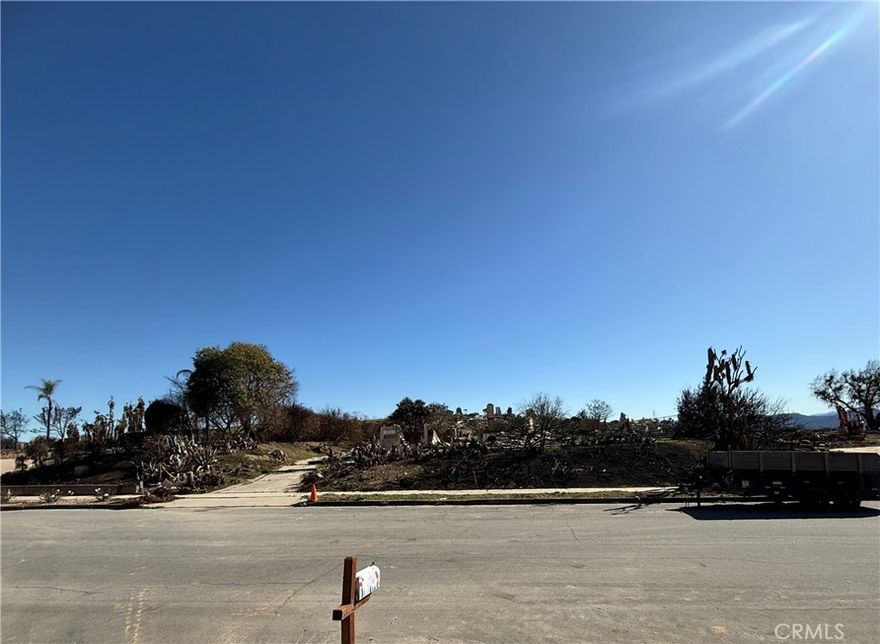 Welcome to 3130 Old Coach Dr, an incredible opportunity to own a stunning 33,976 sq. ft. parcel of land in the desirable hills of Camarillo. Previously home to a beautiful 3-bedroom, 2-bath, 2,019 sq. ft. residence, this property was sadly impacted by the Camarillo Mountain Fire. However, the land has been set up for the clearing process  and will be ready for a new owner to bring their vision to life and build the home of their dreams.

This expansive lot offers a serene setting with breathtaking views of the surrounding mountains and, on clear days, the sparkling ocean in the distance, and of course the lovely views of the City of Camarillo. Whether you're looking to create a peaceful retreat, an estate, or a luxurious custom home, the possibilities are endless on this beautiful property.

Located in a peaceful neighborhood with easy access to local amenities and just a short drive from both Ventura and Malibu, this prime piece of land offers both privacy and convenience. Don’t miss your chance to own a slice of paradise in Camarillo—schedule a visit today and start planning your future on this incredible lot!