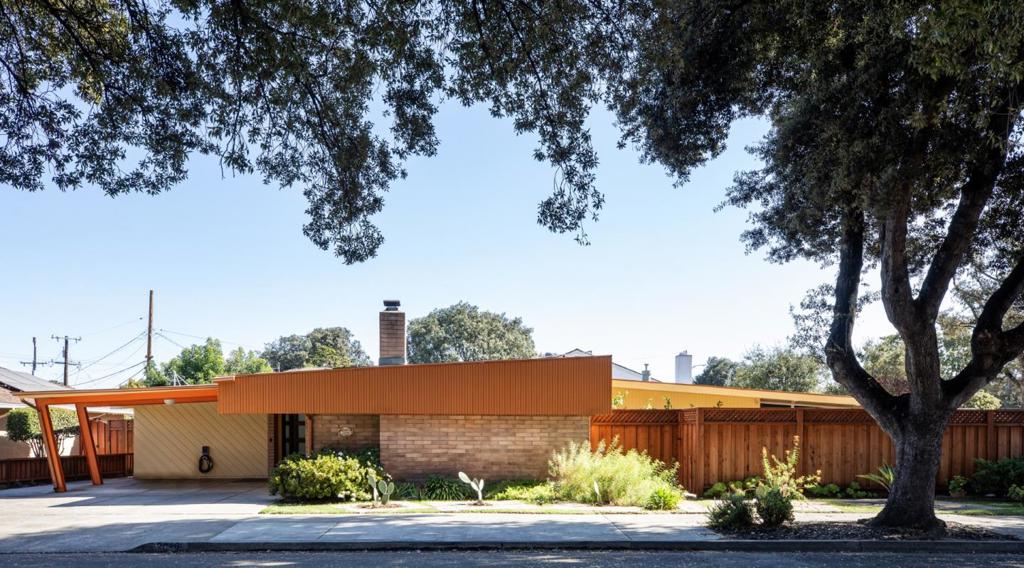 This remarkable mid-century modern home, located in the prestigious Rose Garden neighborhood, is on the market for the first time in 50+ years! The luxurious entry leads to an awe-inspiring dining & living room featuring classic Terrazzo flooring w/ radiant heating, Heart Redwood high ceiling, crystal chandelier & floor-to-ceiling glass panes w/ views of majestic Oak Trees & lovely Southern exposure. The brightly-lit kitchen features a cozy banquette, LG appliances, double ovens & a wall of cabinetry. The bedrooms offer an array of built-in features, including desks, bookcases, chest of drawers, storage cabinet & twin beds. The bathrooms have imported Kerrock Countertops & brushed-gold faucets. Extra's include: Dual-pane windows, Nest Smart devices: thermostat/doorbell/smoke & C02 detectors, Lutron control system, New Semper Solaris Roof, New gutters & downspouts, Owned Solar Panels, (2) Tesla batteries, whole-house H20 filtration system, New redwood fence, vehicle charger & Cal Swim Spa! Excellent proximity to Santa Clara University, Santana Row, Valley Fair, Zanotto's Grocery, The San Jose Municipal Rose Garden & San Jose Mineta Intern'l Airport. This rare MCM come with provenance designed by Hollis Logue Jr. and is within minutes to all that Silicon Valley has to offer!