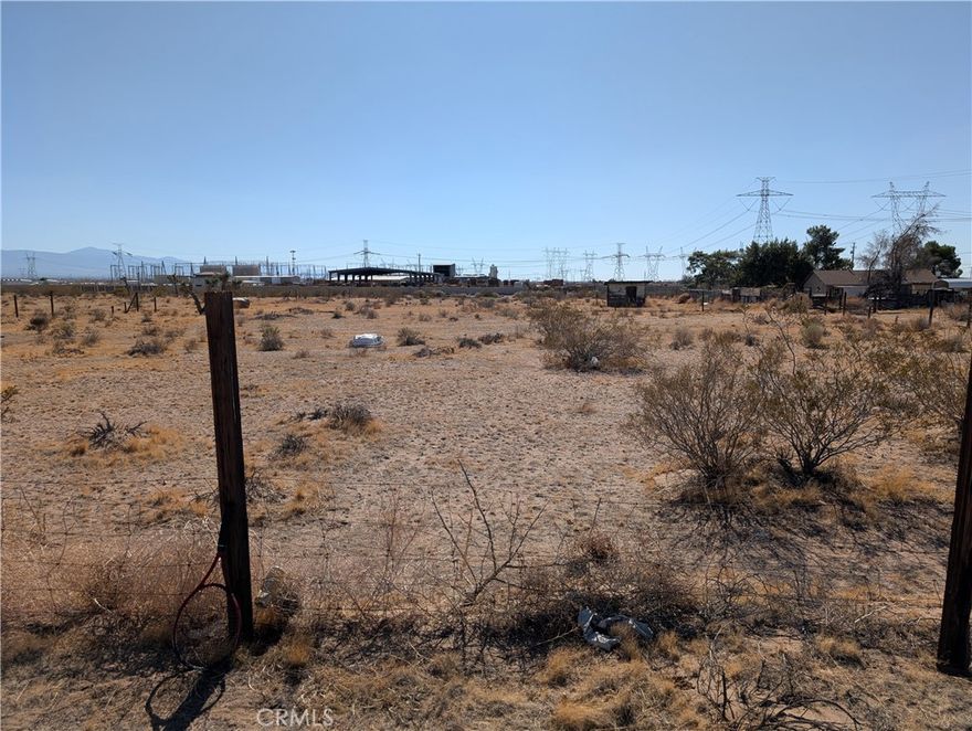 Residential lot right next to the Industrial area. Multi Residential zoning could be good investment for future appreciation. Electric in road on west side of property. Use Lilac Rd from Rancho Rd to access property. Ranch fencing and old shed on property.
GPS Coordinates: 34.555057,-117.424711