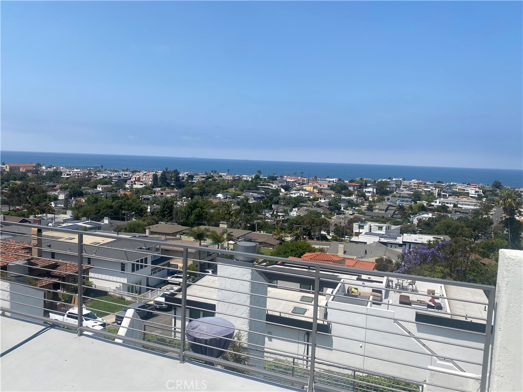 Experience breathtaking ocean views from this Hermosa Beach townhome perched high in the Hermosa Hills. Spanning 1,684 square feet, this 3-bedroom, 2.5-bathroom town home blends beachside charm with everyday functionality in one of the South Bay’s most desirable gated communities—Seaview Villas.
Inside, the entry-level living space features beamed ceilings, recessed lighting, and a spacious, sunlit layout. The living and dining areas flow seamlessly to a private deck, where you can soak in panoramic views stretching from Palos Verdes to Malibu. The adjacent kitchen comes equipped with a gas range, microwave, dishwasher, and refrigerator.
All three bedrooms are thoughtfully placed on the upper level, including a generous primary suite complete with a private ocean-view deck, double-sink vanity, and a walk-in closet!
Community amenities include a sparkling pool, spa, picnic area, recreation room, and extra storage. HOA dues cover basic internet, cable TV, water, trash, sewer, earthquake insurance, and grounds maintenance—everything you need for carefree coastal living. Additional features include a 2-car parking assigned side-by-side close to your unit in the subterranean parking garage with secure gated access.
Ideally located near restaurants, local shops, walking trails, and top-rated schools, this townhome is your opportunity to enjoy the best of Hermosa Beach living with unbeatable views and unbeatable value.