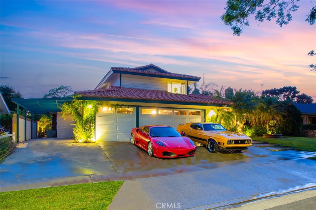 Just minutes from the historic Orange Circle, this truly one-of-a-kind, HGTV-inspired remodeled home is bursting with charm and character, perfectly situated at the end of a quiet cul-de-sac.
Step into a lush, tropical oasis featuring a stunning Spanish fountain framed by mature exotic plants and dramatic uplighting that creates a breathtaking nighttime ambiance. The backyard feels like a private retreat, complete with a large swimming pool enhanced by raised jets for added luxury.
Inside, the home offers two spacious living and family rooms, each with its own cozy gas fireplace — ideal for relaxing evenings or entertaining guests. Throughout the home, you’ll find exquisite details, including imported Spanish terracotta floors, authentic Moroccan fixtures, custom wall coverings, upgraded countertops, newer windows, and beautifully renovated bathrooms.
The downstairs powder room is a true showstopper, featuring a handcrafted wine barrel sink with imported Moroccan hardware — a one-of-a-kind design feature that blends rustic charm with artistic flair.
Outdoors, a gorgeous Spanish-inspired three-tiered waterfall is surrounded by rare, mature tropical landscaping — the kind that takes years to grow and thrive.
In a world of homes that often look and feel the same, this residence stands apart as a rare and unforgettable gem. You simply won’t find another like it.