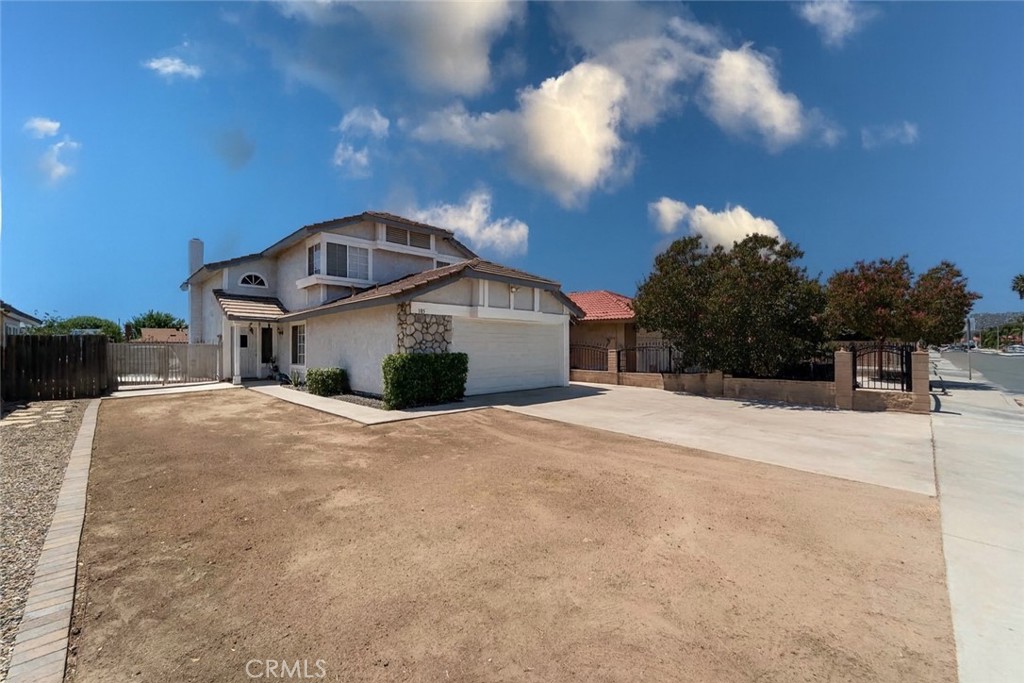 Welcome to 185 Peppertree Dr, located in the rapidly growing city of Perris! This two-story home offers 3 bedrooms, 2 bathrooms, and 1,461 sq.ft. of living space. The layout features a bright and open living room with a cozy fireplace, plus an additional flexible area that can serve as a formal dining room or extra living space. Enjoy the convenience of an attached two-car garage and a cul-de-sac location for added privacy.
The neighborhood is a major highlight, just steps from schools, a beautifully remodeled park, and minutes from new shopping centers, popular restaurants, and eateries. Easy access to the 215 Freeway makes commuting a breeze. This home is priced to sell and offers incredible potential for buyers looking to customize and add their personal touch. Great price, amazing location and no HOA!
