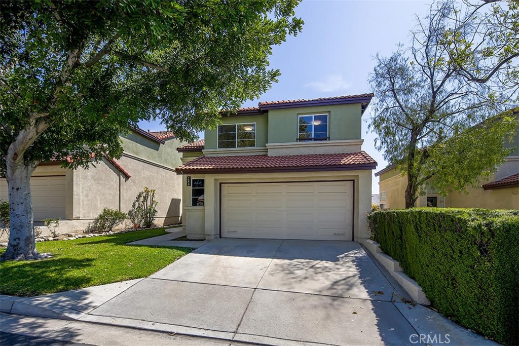Welcome to Terra Vista! This updated 2-story home in gated Terra Vista features 3 beds, 2.5 baths, and 1,818 sq ft of living space on a 4,160 sq ft lot. Highlights include new interior paint, new laminate flooring, recessed lighting, central A/C & heat, and a remodeled kitchen with granite countertops and new stove & hood. The open layout offers a formal living room with high ceilings, family room with fireplace, and a separate laundry room. Upstairs, the spacious primary suite includes vaulted ceilings, a walk-in closet, and a bath with separate tub, shower, and dual sinks. Two additional bedrooms share a full bath. The backyard features a pergola-covered patio and landscaping. Attached 2-car garage with storage. The HOA offers gated entry, a pool, spa, and clubhouse. Ideally situated close to parks, schools, shopping centers, and major freeways.