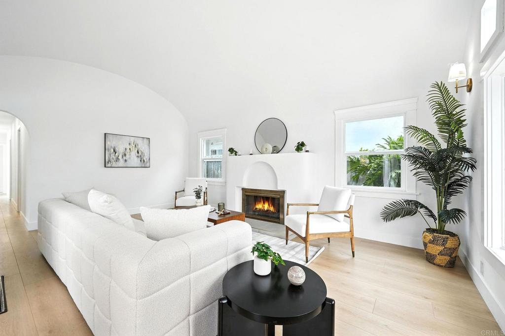 Welcome to 4551 Maryland St – a beautifully renovated Spanish-style home blending timeless character with modern elegance. This 4-bedroom, 3-bathroom residence offers 1,858 square feet of living space on a generous 6,455 sq ft lot. Originally built in 1926, the home has been thoughtfully updated while maintaining its original charm. Step inside to discover a stunning modern Spanish design, featuring a gorgeous kitchen with quartz countertops, a stylish tile backsplash, and high-end finishes throughout. The inviting courtyard provides a peaceful retreat to relax and unwind, while the dedicated laundry room adds convenience to everyday living. Beyond the main home, this property offers a rare bonus: a detached ADU (Accessory Dwelling Unit) located in the backyard perfect for guests, rental income, or a private home office. The 3-car garage and alley access further enhance the potential, offering ample parking and expansion opportunities. Whether you're an investor, developer, or homeowner looking for a unique and versatile property in one of San Diego’s most desirable neighborhoods, this is a must-see opportunity.