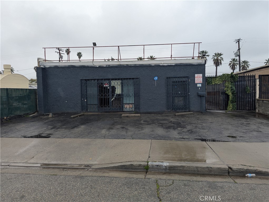 Industrial building Zoned M1 with 3,040sf of mostly open space with two detached restrooms. Owner last used the building as a bakery/tortilleria/meat market/produce and restaurant combined businesses three years ago. Features two walk-in coolers (unknown to be in working condition), two hoods (unknown to be in working condition), kitchen buildout area is available. Per seller, building features 3p, 220 and 110 electricity. In need of TLC but solid structure.