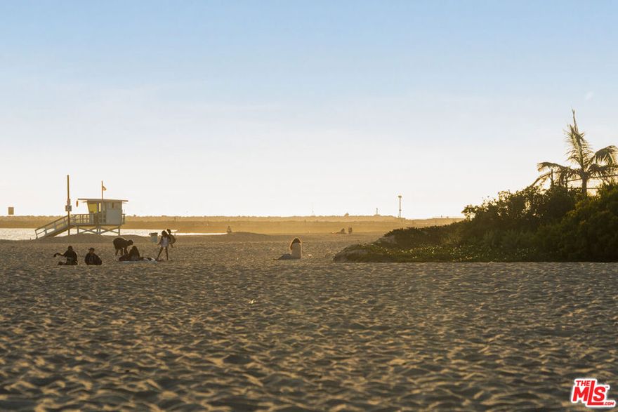Don't miss this rare opportunity to live just steps from the sand! Enjoy stunning ocean, city, and lagoon views in this beautiful, spacious, and bright 3-bedroom, 3.5-bath penthouse with a townhome-style layout. The home features new beachy hardwood floors, soaring ceilings, and large windows that flood the space with natural light. Designer touches create a warm and inviting atmosphere. The primary bedroom boasts a balcony with a beach view, while the kitchen is equipped with high-end appliances and offers both style and functionality. The dining area is perfect for entertaining, and the unit includes a large washer/dryer, Wi-Fi, cable, and large flat-screen TVs. Furnishing is available as an option. Located just half a block from the beach and a short walk to town, restaurants, shops, and stores, this quiet and well-maintained building also provides two enclosed parking spaces and access to a shared bike room. Coastal living at its finest!