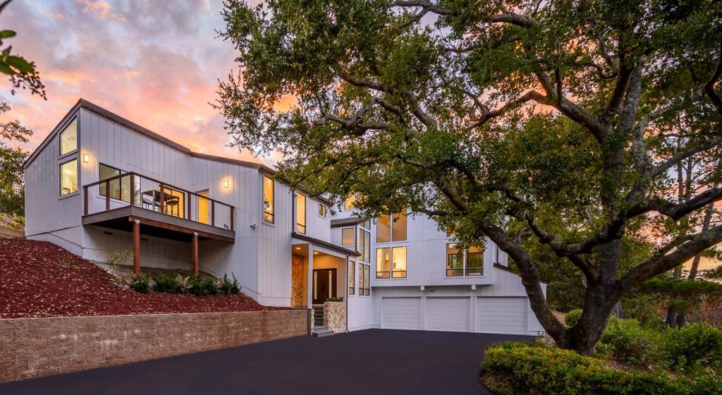 Experience the height of luxury in this modern home boasting four suites. Vaulted ceilings and expansive windows flood the space with natural light and create a welcoming living area. The sleek new kitchen features updated Viking appliances and quartz countertops. Enjoy breathtaking views of the valley from multiple balconies, including a private retreat on the third floor. The dining nook overlooking the deck leading to the backyard and pool is an entertainers dream. The backyard oasis is perfect for gatherings and relaxation, with seamless access ideal for indoor-outdoor living. Fully renovated bathrooms feature vanity lights, quartz countertops, heated mirrors, and ample storage space. Primary bedrooms on the second and third floors offer balcony views and walk-in closets. A studio guest room, three-car garage, and large yard space. Proximity to top Palo Alto School District schools, Stanford University and private education.