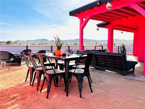 Photo of 2884 Fortuna Ave, Landers, CA 92285 (MLS # JT26103677)