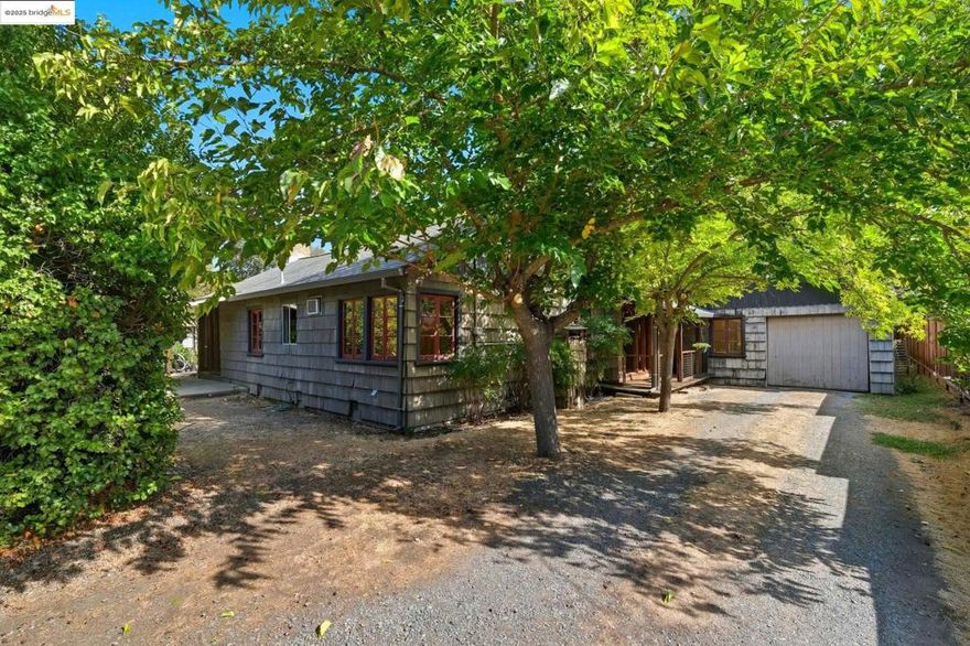 Welcome to Lancaster Castle! This rustic cottage in the heart of Walnut Creek, adjacent to the Tice Valley and Park Mead neighborhoods, offers an incredible opportunity to make this home your own. Step into this unique floor plan showcasing vaulted Redwood ceilings, a vintage kitchen, and a wall of windows overlooking the spacious backyard. The home features 3+ bedrooms and 1 bathroom, with another bathroom plumbed for your finishing touches. This home offers the new homeowner the opportunity to remodel, update or expand. Situated on almost a third of an acre, this level lot offers endless possibilities for renovation or potential ADU development. Just a short distance to top rated Walnut Creek Schools, downtown shops and restaurants, BART, and freeway access. Bring your vision!