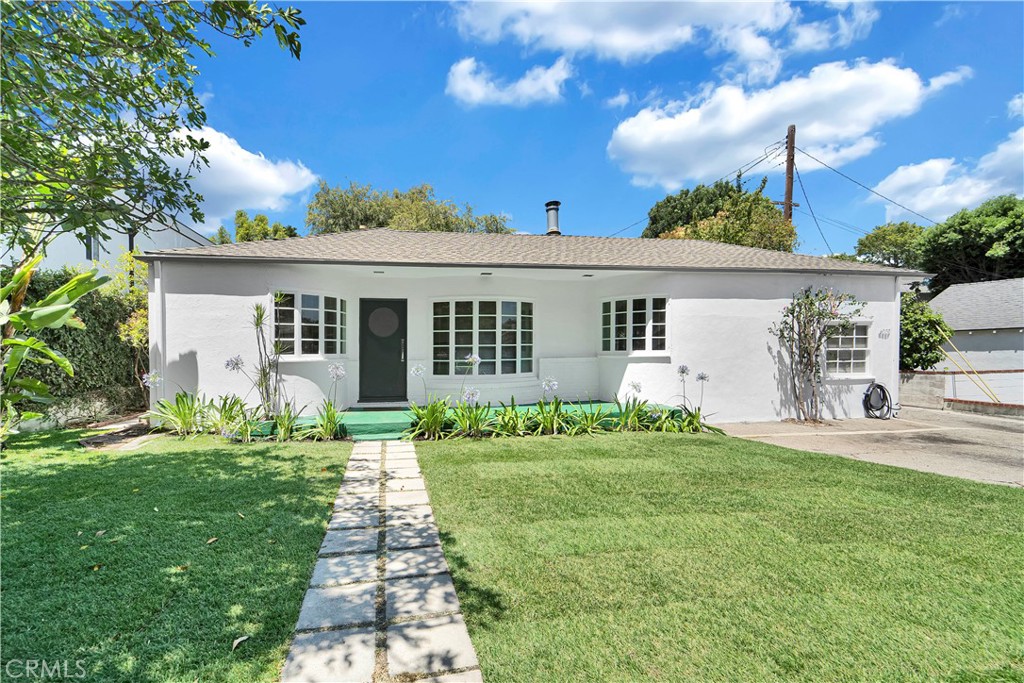 Welcome to this charming and highly versatile property located in the heart of Sherman Oaks, South of the Boulevard. Set on a generous 13,600 sq. ft. lot with mature trees and a serene, park-like setting, this rare offering presents an exceptional opportunity for end users, investors, or developers.
Ideally situated in one of Sherman Oaks’ most sought-after and walkable neighborhoods, you're just steps from Whole Foods, Pavilions, CVS, and a host of popular shops, cafés, and restaurants.
The main residence spans approximately 1,800 sq. ft. and features 3 bedrooms and 3 bathrooms, including a primary suite that opens to a lush, expansive backyard. The open-concept layout offers a seamless flow between the living and family rooms, creating an ideal setting for entertaining or everyday living.
Adding to the property’s flexibility is a detached 1-bedroom ADU of approximately 700 sq. ft., complete with a full kitchen, washer/dryer, and a spacious bedroom — perfect for rental income, guest quarters, or multi-generational living.
According to LA City Planning, 4227 Van Nuys Blvd. is zoned RE-11. City Planning states owner has the option to build additional ADUs. . This property offers a wide array of development possibilities and long-term income potential. Buyer advised to verify the accuracy of all statements. Bring your builders, investors, or end users — this is a rare chance to own a unique and expansive property in one of LA’s most livable and vibrant communities.