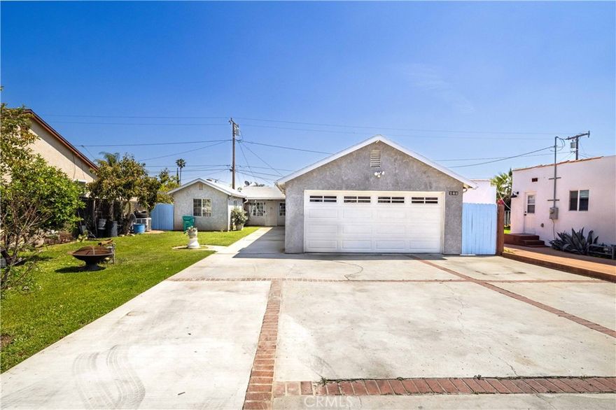 Endless Potential in San Fernando! This spacious 3-bed/2-bath home with a smart layout also includes a permitted 1-bed/1-bath attached unit, making it ideal for multi-generational living or immediate rental income. Sitting on a generous 7,039 sq. ft. lot, the property offers room to expand, build, or maximize value with the detached 20x20 garage that’s perfect for an ADU conversion. With a bright open floor plan and prime location near parks, schools, shopping, and freeways, this home offers both comfort and long-term investment opportunity.