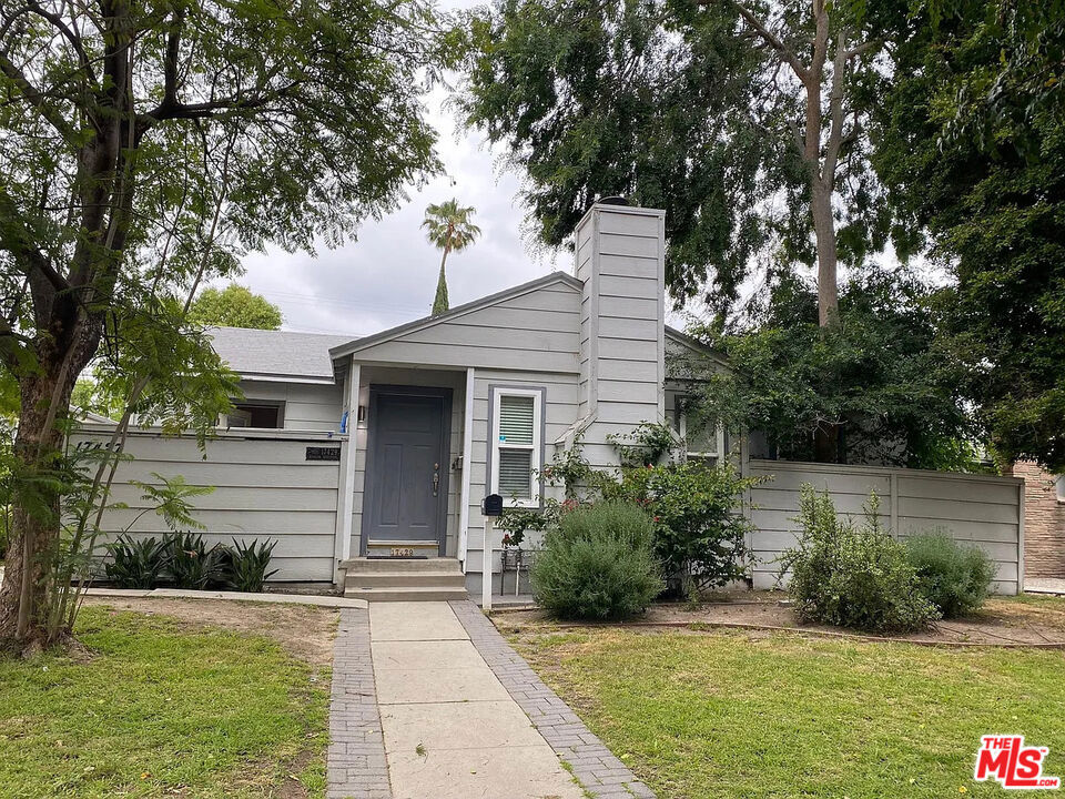 Charming 3 bed 2 bath home with Private Yard. This beautiful 1,417 sqft home offers a perfect blend of style and comfort. Located in Encino, this property features Custom Light Fixtures throughout, Double-Pane Windows for improved energy efficiency and sound insulation, Hardwood Floors, Cozy Fireplace, Porcelain Tile, Crown Molding, and Fresh Paint. Additional amenities include: One-Car Garage with space for one additional vehicle in the private backyard, In-Unit Washer and Dryer, and Private Backyard.