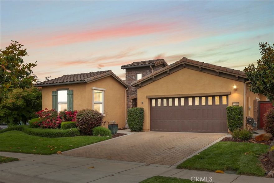 Resort living at Trilogy Monarch Dunes! This former model Monterey plan is set on a desirable corner lot with a beautifully landscaped, park-like backyard and abundant natural light.

Inside, the flexible layout offers 2 bedrooms plus a bonus room with French doors — perfect for a home office, gym, or guest space. The open-concept great room features a cozy fireplace, dining nook, and a chef’s kitchen with granite counters, stone backsplash, and JennAir Euro-style appliances. Expansive windows in the living room, kitchen nook, and primary suite showcase the backyard views and bring the outdoors in.

Added highlights include solar power, built-in garage cabinets, and thoughtful upgrades throughout.

Living here means enjoying all the perks of Trilogy Monarch Dunes — a resort-style, all-ages community offering the Monarch Club, Adelina’s Bistro, Sandalwood Spa, fitness center, pickleball, tennis, and championship golf. Plus, Dignity Health Center is right in the neighborhood, providing convenient healthcare just minutes away.

Move-in ready, beautifully maintained, and located in one of the Central Coast’s most sought-after communities — this home captures the best of relaxed California living.