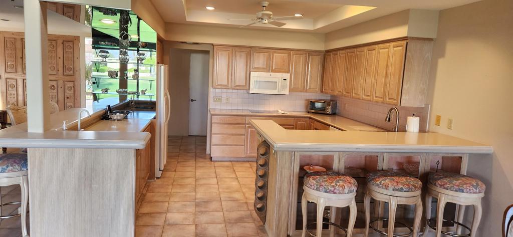 This beautiful expanded 2 bedroom /open concept condo with upgraded kitchen is located on the Classic 10th fairway of the famous private Bermuda Dunes Country Club with views of the golf course, sunrises and a serene pond. Both spacious bedrooms have two closets: each having a walk-in closet. And they both have sliding glass doors accessing the courtyard patio. Expanded great room and Dining Room. Large Golf cart/Storage garage in entry courtyard. HOA is $603 and includes exterior maintenance including roof, pool/spa, Tennis & Pickleball Courts. BD Security Assoc. is $210/mo. includes Spectrum cable TV. Imperial Irrigation District for lower electricy rates. Come and enjoy casual desert living full-time or for a vacation retreat!