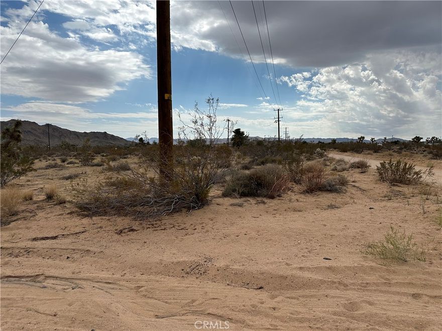 This is 3 lots - total of 5 acres, being sold all together.  1 lot is 2.5 acres and 2 lots are 1.25 acres each.  Located at the intersection of Alta Ave. and Drexel Rd.  Parcels are located on the Southeast corner of the intersection.

Property has electric pole on the corner and a fire hydrant.  Phone cable located across the intersection on the Southwest corner.

Buyer would have to have a propane tank and septic tank to develop.