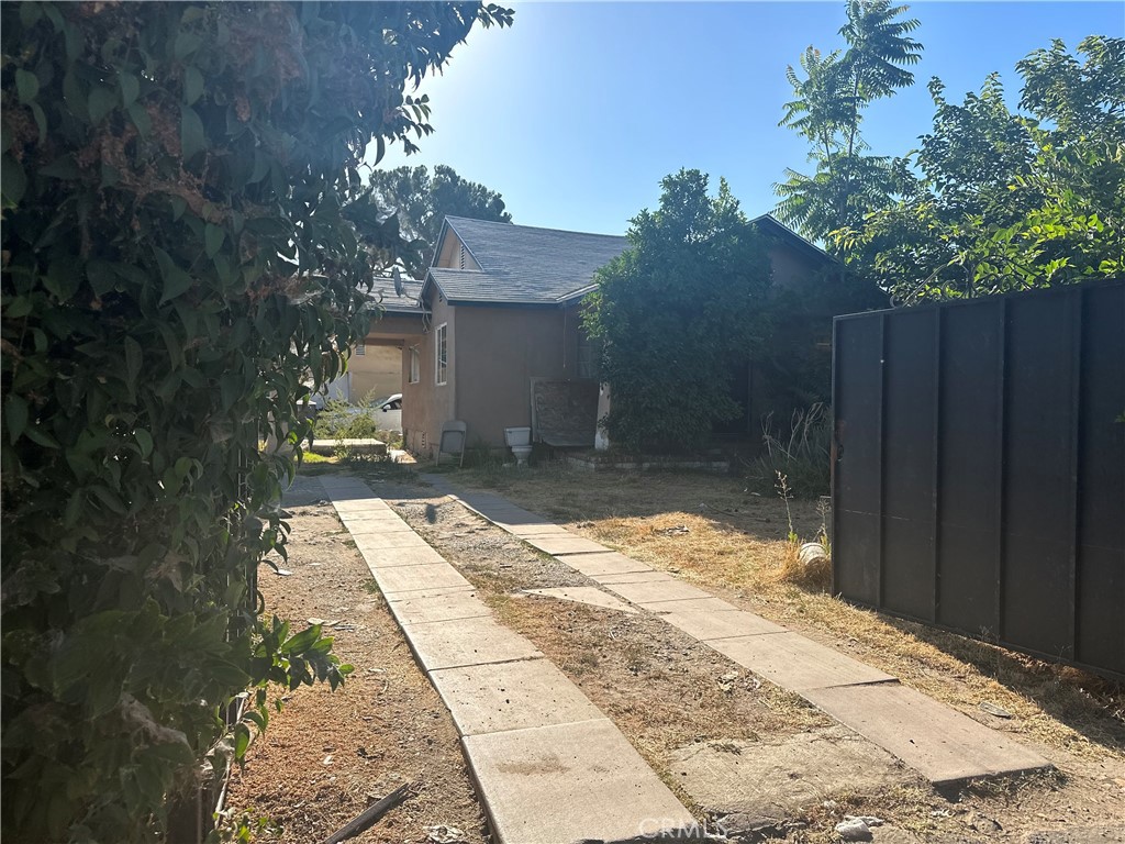 Discover this hidden GEM. This property is a fixer, needs a lot of work. There's 3 bedrooms with 1 bath and a huge lot, 20,000 sqft with a detached 2 car garage. This property offers endless potential for those ready to invest in a renovation project. Don't miss the chance to bring this home back to life and create your dream home or a smart investment.