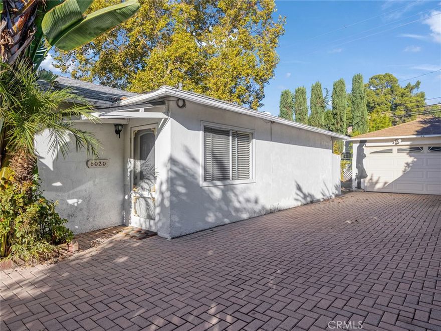 Welcome to this beautifully updated 2-bedroom, 1-bath single-story home, part of a well-maintained duplex in the heart of Woodland Hills. Offering approximately 800 sq. ft. of living space, this home features an open and inviting floor plan with central A/C and heat, spacious living and dining areas, and a bright kitchen with ample cabinet space. Enjoy the privacy of your own fenced backyard, ideal for relaxing or entertaining outdoors. Additional highlights include a 1-car covered carport, convenient laundry hookups, and a great location close to shopping, restaurants, and freeway access. Located just minutes from Ventura Blvd, Warner Center, and The Village at Topanga, this home provides the perfect blend of comfort, convenience, and privacy.