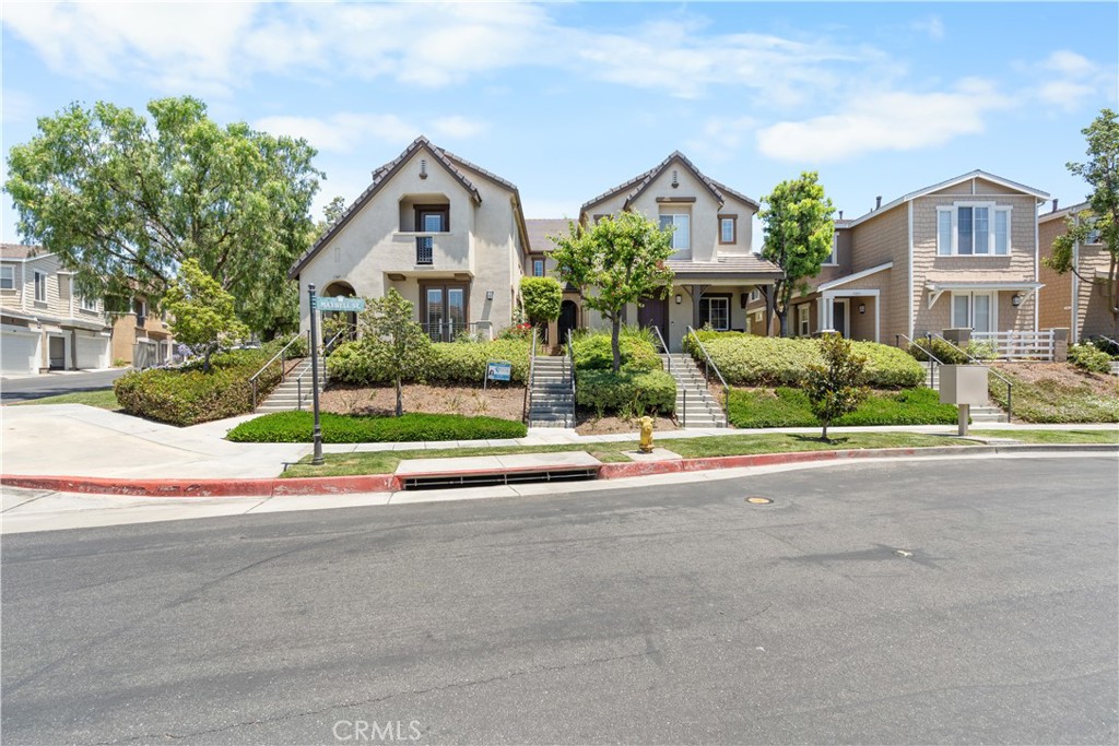 Welcome to this beautifully upgraded 2 bed, 2 full baths in the highly desirable Amerige Heights community in Fullerton. All living space is on the same floor, including the bedrooms, dining room, and living room with a cozy gas lit fireplace, and balcony. Featuring a wide open-concept living room currently serving as a third bedroom—ideal for accommodating evolving lifestyle needs or guest quarters. This open floor plan is the most popular floor plan designed for convenience. This home comes with natural wood flooring, washer and dryer, stainless appliances, beautiful chandelier, high-speed internet included. All the luxurious amenities that come with living in this wonderful community! You will have access to the community pool, spa, parks, tennis courts, tot lot, and community club house. HOA includes high speed internet. Also, within walking distance are the top-rated schools in the Fullerton School District which are Fisler Elementary, Parks Jr. High, and Sunny Hills High School. This location is also near the Amerige Town Center, which features a variety of restaurants, shops, fitness center, and much more! You’ll just fall in love with this home.