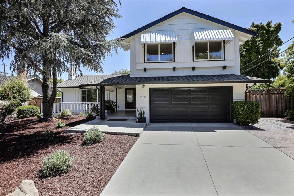 Fully renovated home in Cupertinos most desirable neighborhoods. With a brand new primary & hallway bathroom. Extra sunroom (not part of the living square footage) & a big lot offers plenty of opportunities like future ADU. Near top-ranked Eaton Elem.,Lawson Middle, & Cupertino High. With easy access to Apple Infinite loop & Apple Campus, Cupertino Main Street, & major routes like hwy 280 & Lawrence Expy. Featuring double French doors & a covered front porch. Inside, is a spacious living room with brand new hardwood floors, recessed lighting, & marble fireplace. The open-concept kitchen & family room features white cabinetry, stainless steel appliances: refrigerator, cooktop, hood, microwave, oven, & dishwasher, a garden window, tile backsplash, & quartz countertops. A breakfast nook, a formal dining area & a bright family room that opens to a sunroom with skylights. The primary bedroom is spacious & newly renovated primary bathroom has, Toto washlet, frameless glass walk-in shower, freestanding soaking tub, modern double-sink vanity with quartz countertop, & lighted LED mirror with a built-in defogger. Other bedrooms are bright with a closet. Also includes a storage room, powder room, laundry room with built-in cabinetry & epoxy floored 2-car garage.This home is a rare find.