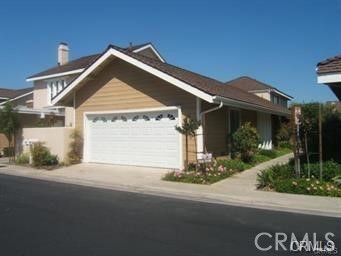 Charming single level home (no interior steps), remodeled kitchen with upgraded cabinets, granite counter tops, stainless steel appliances (refrigerator included) and sink, recessed lighting, and garden window. Wall between kitchen and dining area removed to open up the kitchen. Wood-like laminate & tile flooring throughout. Bathrooms recently remodeled with quartz countertops, new sinks, fixtures and lighting. Newer A/C unit and hot water heater. Interior doors recently upgraded from flat to recessed paneled. Decor outlets and rocker switches. Flush recessed lighting. Cathedral ceilings and lots of upgraded windows & sliders and mirrored wardrobes add to the spacious light and bright ambience. Cozy back yard with lush landscaping, citrus trees and large patio. Private front patio off master bedroom. Direct access to two car garage; washer & dryer plus 2nd fridge included. Original valuable hanging artwork is included in the sale. New roof in 2024. Excellent quiet location in the fabulous Village of Woodbridge. Only 100 yards from North Lake Swim Club. Woodbridge has been rated the Best Place in America to raise a Family by Parents Magazine and it's been named the #1 HOA in the Country. Living in the Village of Woodbridge is equivalent to residency in a high end resort with its unmatched amenities including 22 Pools, 23 Tennis Courts, 4 Pickleball Courts, bocce, basketball, sand volleyball, shuffleboard, numerous parks with play equipment, BBQs & picnic facilities, walking/biking paths, boating, fishing and 2 lakes with Beach Clubs & lagoons. Irvine has ranked as the Safest City in America for 18 Consecutive years and its schools are in the top 2% in the State.